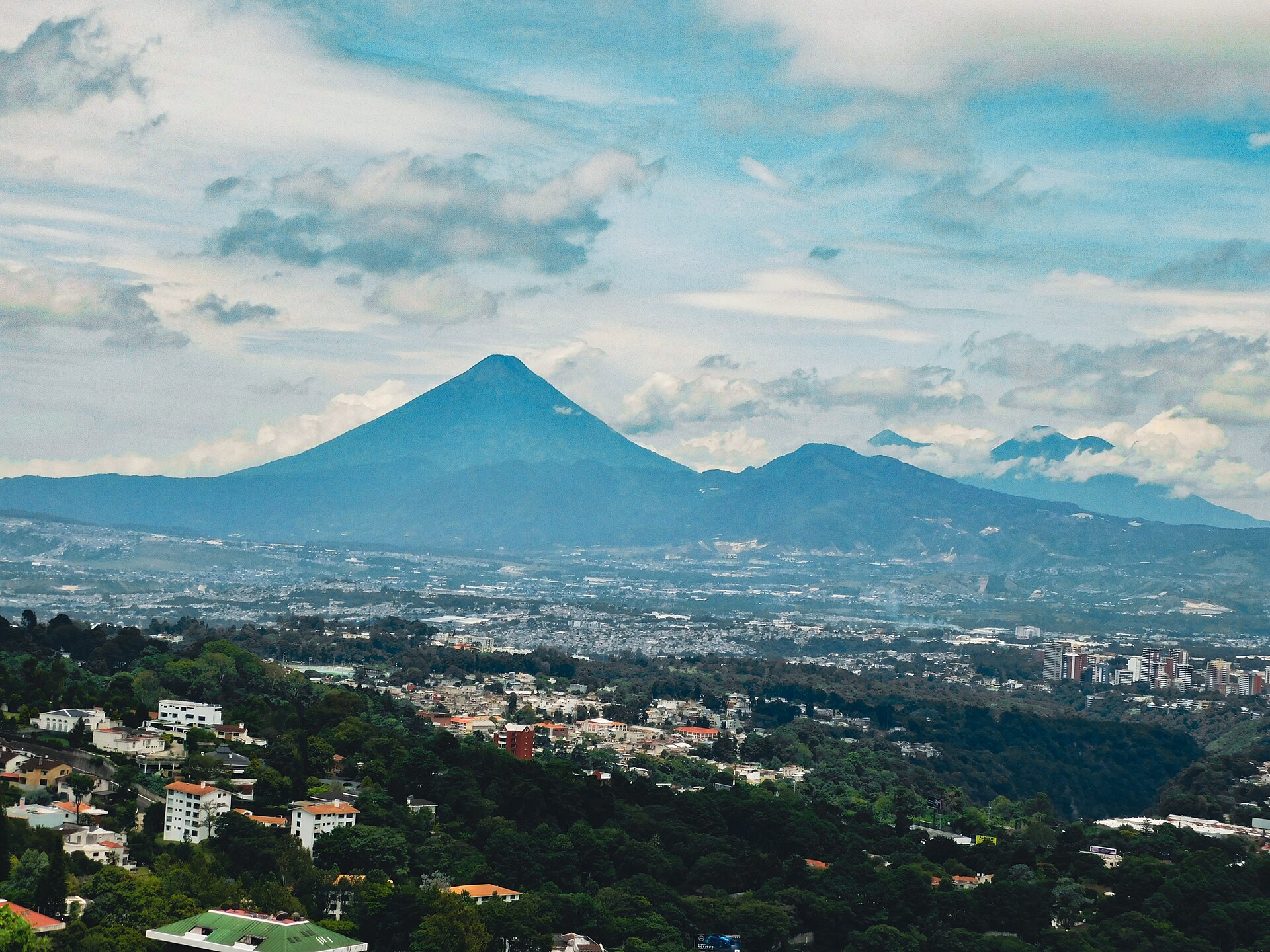 Guatemala City skyline with mountains and volcanoes